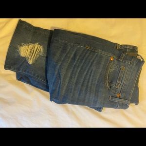 Madewell skinny jeans with knee rip